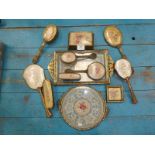 Twelve items of gilt and glass dressing table furniture to include trays, hand mirrors, brushes