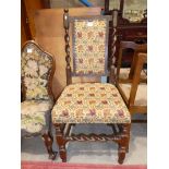 An 18th Century oak chair with twist back, tapestry seat and back