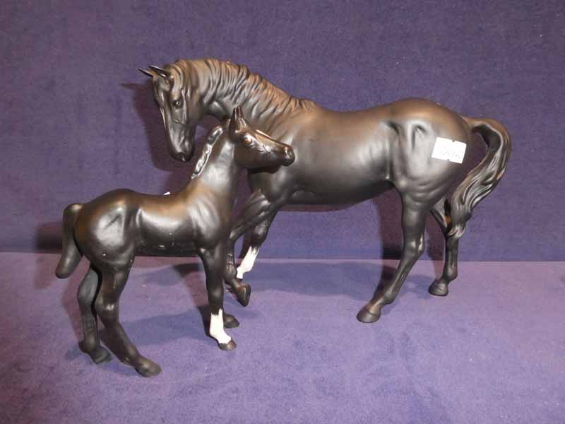 A Beswick pottery Black Beauty and a foal, matt finish