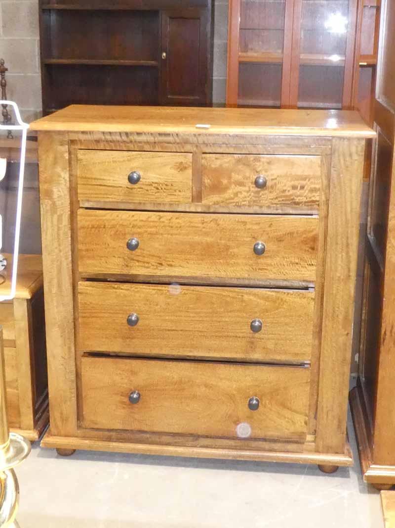 A fruitwood bedroom chest of two over three drawers to match previous lot