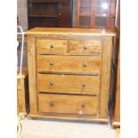 A fruitwood bedroom chest of two over three drawers to match previous lot