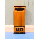 An Art Deco oil fired portable room heater in classic Art Deco design, metal case