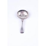 A George III silver caddy spoon with brightcut floral decoration to the bowl, London 1819 by George