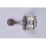 A William IV silver caddy spoon with brightcut decorated fluted square bowl, Birmingham 1831 by