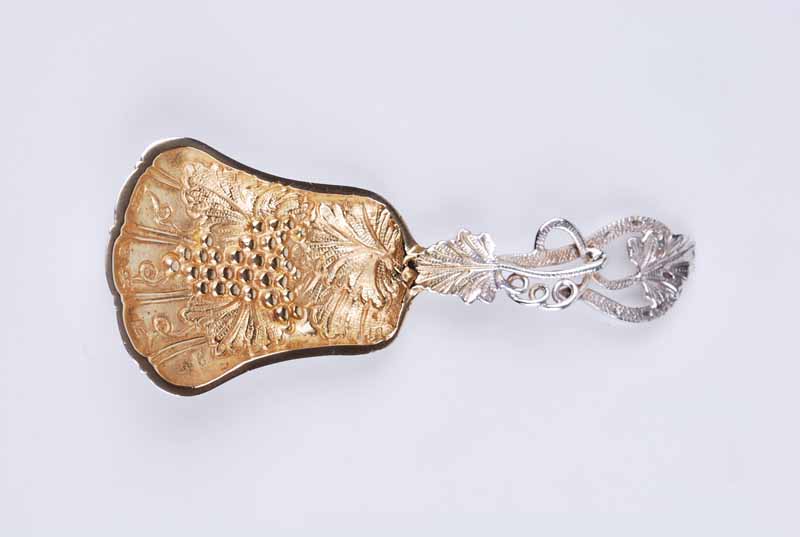 A modern silver caddy spoon with trailing vine tendril handle and grape and vine decorated bowl, - Image 2 of 3