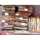 A large collection of rare 1960's and later seven inch vinyl singles, complete with covers (500+)