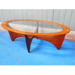 A 1970's eliptical G Plan 'Astro' coffee table 122.5cm x 66cm x 42cm