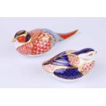 A Royal Crown Derby pheasant paperweight together with a further partridge example (2)