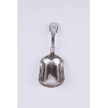 A Victorian fiddle pattern silver caddy spoon with brightcut decoration, London 1872 by Charles