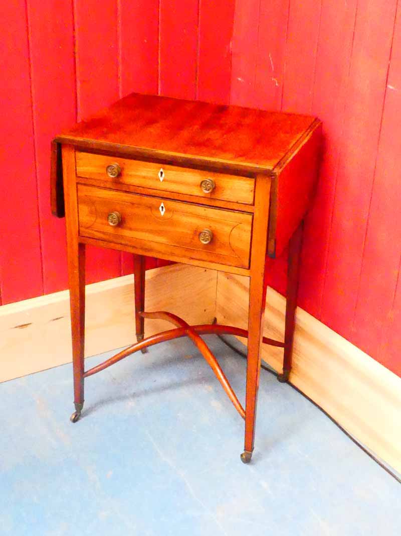 A George III mahogany narrow Pembroke table, with two graduated drawers surmounting square