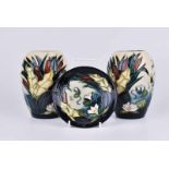 A pair of Moorcroft Pottery Bullrush pattern vases 13 cm H and matching pin dish 11.5 cm dia., dated