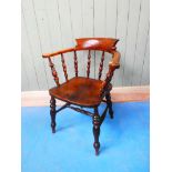 A good Victorian elm seat smokers bow Windsor chair