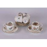 A Royal Worcester mid-century set of six demi-tasse coffee cups and saucers decorated with