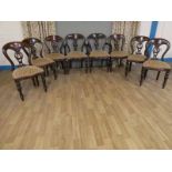 Mid century set of eight mahogany buckle back dining chairs , six and two carvers