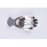 A modern novelty silver caddy spoon in the shape of a hand, Sheffield 1975 by Francis Howard Ltd.,