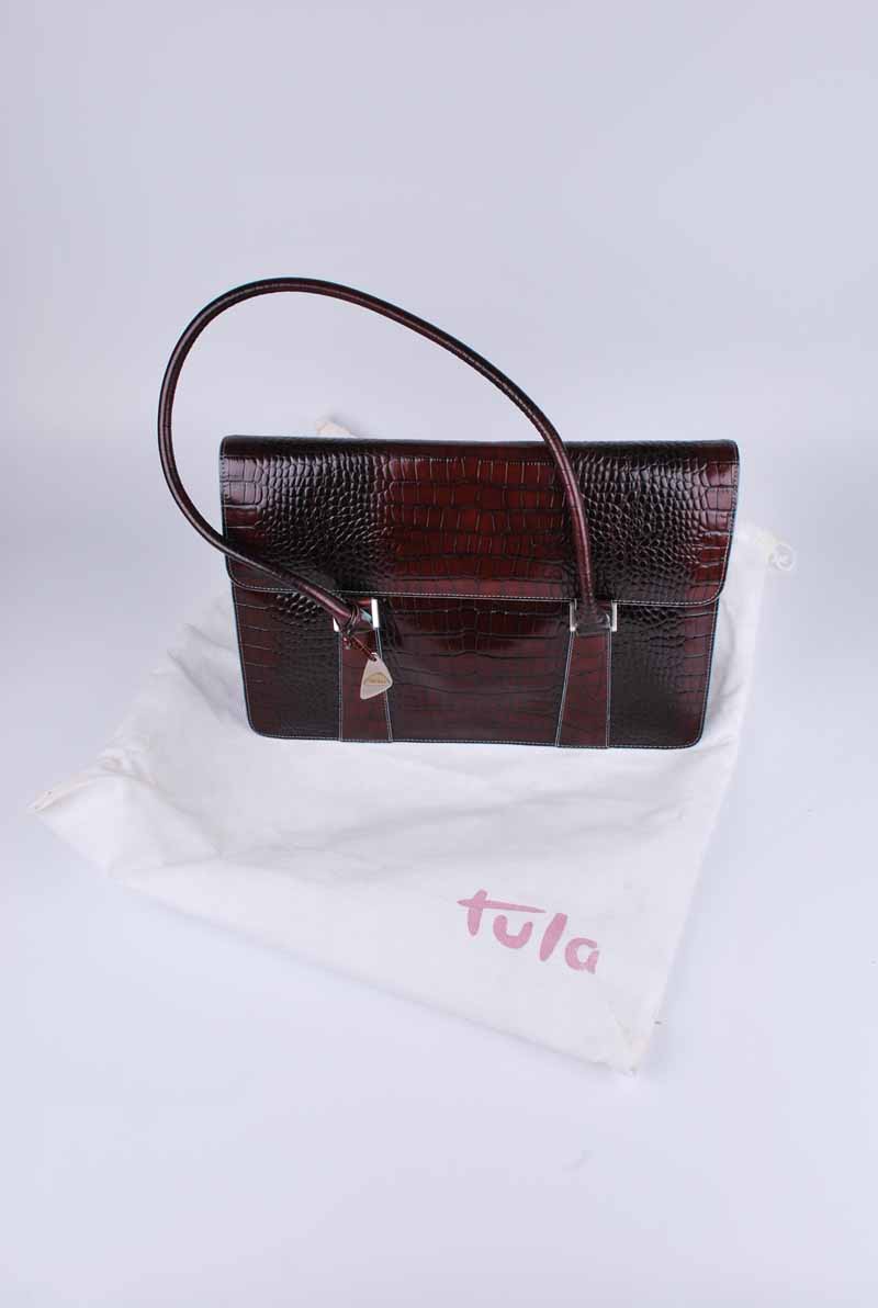 A Tula vintage crocodile skin handbag with turquise lining, complete with original dust bag