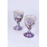 A pair of Cobridge Collector's Club stoneware lilac goblets, impressed marks to the base and