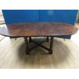 Mid century handmade oak two leaf draw action table in an earlier style length 214cm