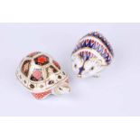 A Royal Crown Derby mother tortoise Imari edition paperweight together with a further hedgehog