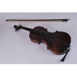 A late 19th Century cremona style violin with Antonius Stradivarius label, bow inscribed Sivort
