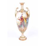 A Royal Worcester slender alhambra style vase with hand painted peacock decoration by C.V. White and