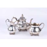 A Victorian silver three piece tea set, London 1858 & later by Edward & John Barnard of segmented