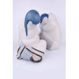 Two large Lladro figures, one of a sleeping Inuit Eskimo boy 26 cm H, the other a girl 32 cm H, by