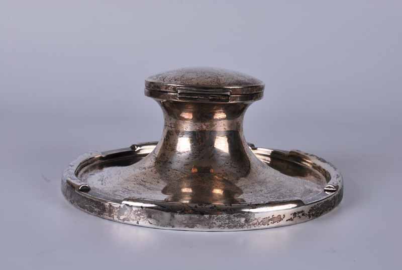 A George V silver oversize capstan inkwell, Birmingham 1912 by A. & J. Zimmerman Ltd., complete with