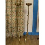 A fine pair of puginesque brass candlesticks standing on trefoil feet at 120cm H