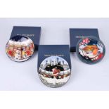Three Moorcroft pin dishes,in Chistmas themes, all boxed and with four Moorcroft carrier bags (7)