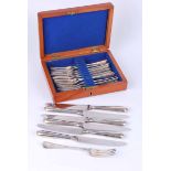 A CASED SET OF 12 Victorian silver starter forks, London 1882 by George Adams, 303g together with