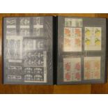 Album of early Queen Elizabeth II mint decimal stamps including booklets, traffic lights, gutter