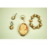 A suite of shell cameo jewellery including an 800 grade silver gilt bracelet, a 9 ct gold mounted