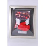 Photograph of Mike Tyson with framed signed glove, 62cm x 52cm