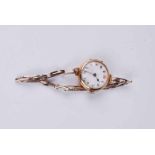 A lady's 9 ct gold wristwatch on 9 ct expanding strap, the white dial with Arabic chapter ring, 16.5