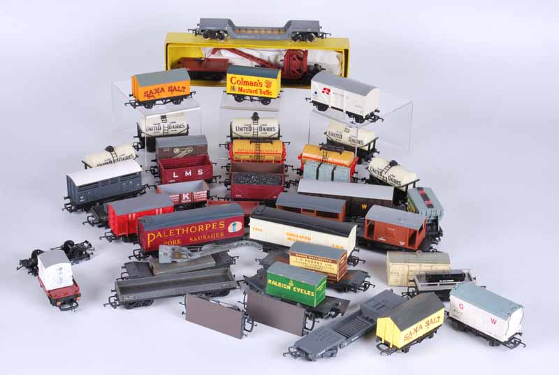 Collection of 50 plus railway goods wagons in three boxes all unboxed