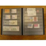 Album of G.B mint Queen Elizabeth II stamps including gutter pairs, sets, booklets