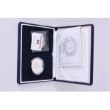 The royal celebration silver proof set. 2003 coronation anniversary silver proof crown, 2002