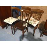 Set of four elm seat stick back Windsor chairs.