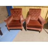 Pair of early 20th century scroll back armchairs.