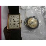 A silver cased lady's wrist watch- no strap and a 1930's rolled gold gents tank style wrist watch