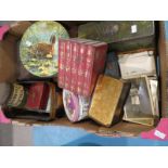 A tray of vintage tins,boxes and postcards.