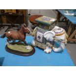 A country artists galloping shire CA959, free as the wind, and an elephant plant stand.