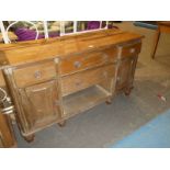 Victorian pine dresser base with glass handles.