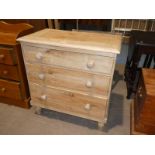 Small Victorian pine three drawer chest.