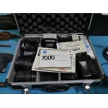 A selection of photographic equipment including case, Minolta 7000 camera set, lenses, flash and