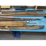 A selection of split cane fishing rods and part rods.