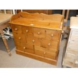 Modern narrow four over three over two drawer chest.