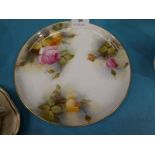 A Royal Worcester hand painted rose plate, unsigned though date marked for 1913, 23 cm dia.
