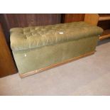 Mid 20th century green velour ottoman.